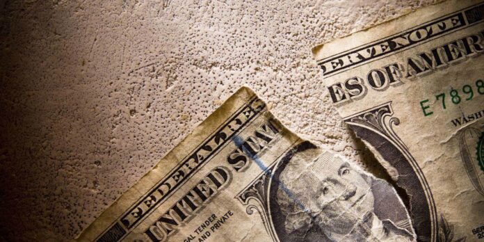 Torn Dollar and dirty Dollar