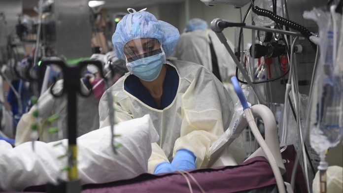 Treatment of patients in the ICU aboard USNS Comfort in New York, New York