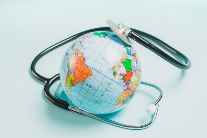 stethoscope-globe-blue-background